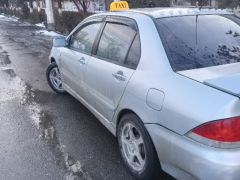 Сүрөт унаа Mitsubishi Lancer