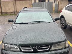 Photo of the vehicle Nissan Primera