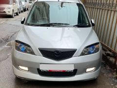 Photo of the vehicle Mazda Demio