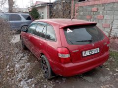 Photo of the vehicle Mazda 323