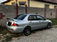 Фото авто Mitsubishi Lancer