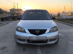 Photo of the vehicle Mazda Demio