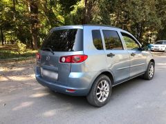 Сүрөт унаа Mazda Demio