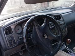 Сүрөт унаа Nissan Primera