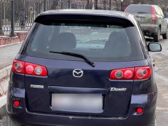 Photo of the vehicle Mazda Demio