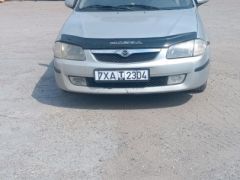 Photo of the vehicle Mazda 323