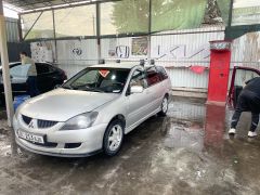 Фото авто Mitsubishi Lancer