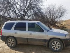 Photo of the vehicle Mazda Tribute