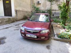 Фото авто Mazda 323