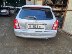 Photo of the vehicle Mazda 323