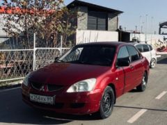 Photo of the vehicle Mitsubishi Lancer