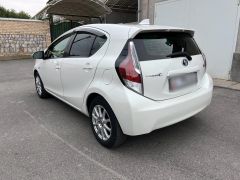 Фото авто Toyota Prius c