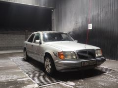 Сүрөт унаа Mercedes-Benz W124