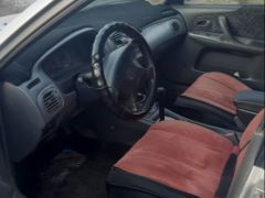 Фото авто Mazda 323