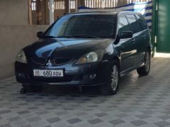 Фото авто Mitsubishi Lancer