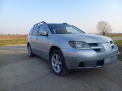 Сүрөт унаа Mitsubishi Outlander