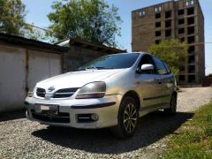 Фото авто Nissan Almera Tino