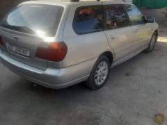 Photo of the vehicle Nissan Primera