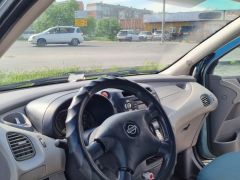 Сүрөт унаа Nissan Almera Tino