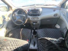 Сүрөт унаа Nissan Almera Tino