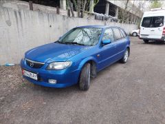 Фото авто Mazda 323