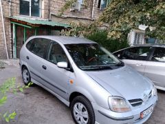 Фото авто Nissan Almera Tino