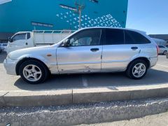 Photo of the vehicle Mazda 323