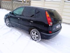 Photo of the vehicle Nissan Almera Tino