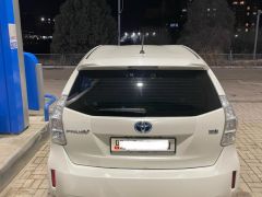 Фото авто Toyota Prius v (+)