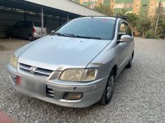 Сүрөт унаа Mitsubishi Space Star