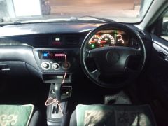 Фото авто Mitsubishi Lancer