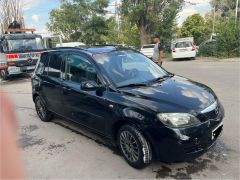 Сүрөт унаа Mazda 2