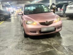 Photo of the vehicle Mazda Demio