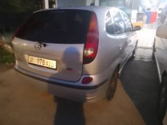 Сүрөт унаа Nissan Almera Tino