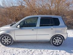 Фото авто Mazda Demio