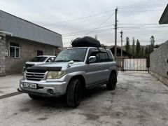 Сүрөт унаа Mitsubishi Pajero iO