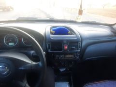 Сүрөт унаа Nissan Almera