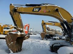 Сүрөт унаа Caterpillar Экскаваторы-погрузчики