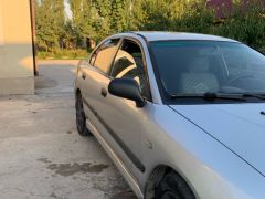 Сүрөт унаа Mitsubishi Carisma