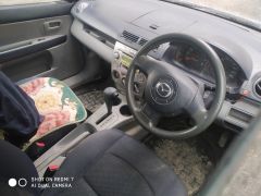 Сүрөт унаа Mazda Demio