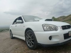 Photo of the vehicle Subaru Impreza