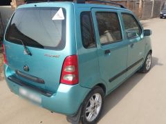 Photo of the vehicle Suzuki Wagon R+