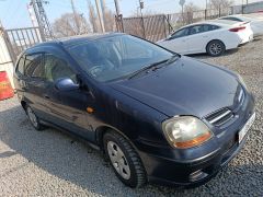 Photo of the vehicle Nissan Almera Tino