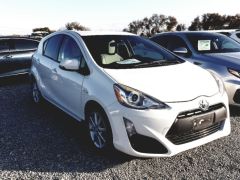 Фото авто Toyota Prius c