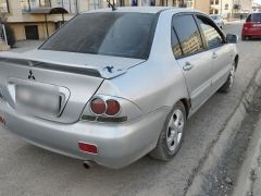 Фото авто Mitsubishi Lancer