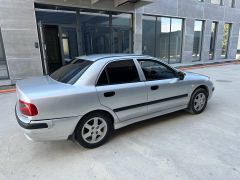 Сүрөт унаа Mitsubishi Carisma