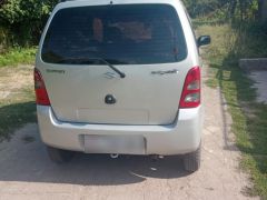 Photo of the vehicle Suzuki Wagon R+