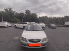 Фото авто Mazda 323