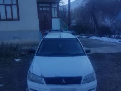 Фото авто Mitsubishi Lancer