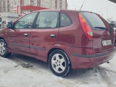 Фото авто Nissan Almera Tino